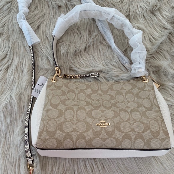 Coach Handbags - Coach Small Mia Shoulder Bag In Signature Canvas.